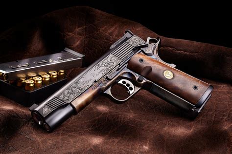 A customized 1911 handgun with aftermarket sights and grips