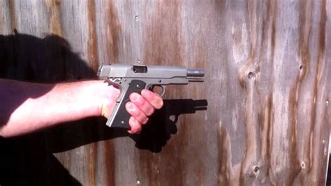 A close-up of the 1911's recoil management system