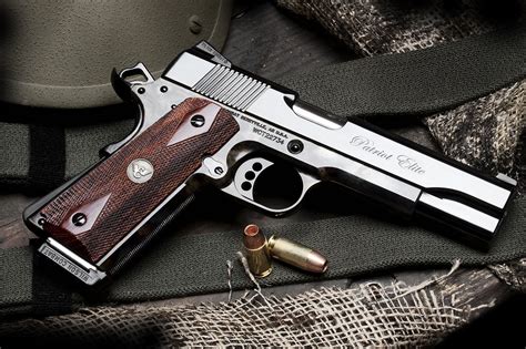 A 1911 pistol with a tactical holster and accessories