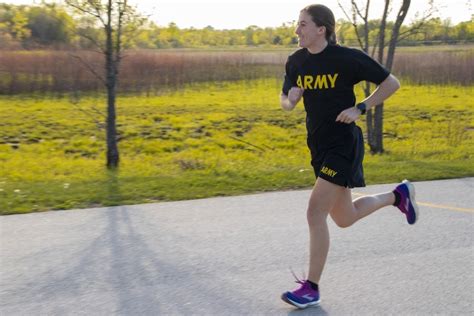 A soldier running during a PT test