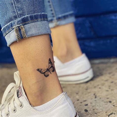 3D butterfly tattoo on ankle