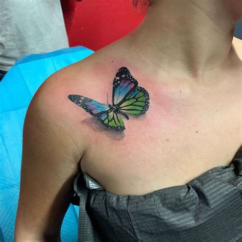 3D butterfly tattoo on shoulder