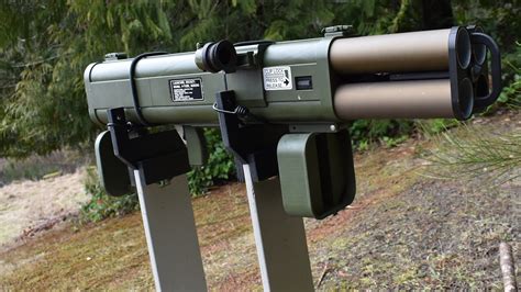 Soldiers training with a 4-barrel rocket launcher