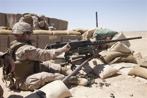 Soldiers training with a 50 cal machine gun