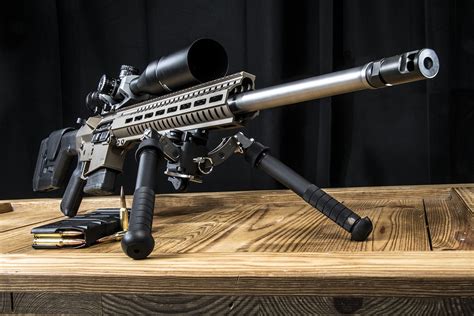 A rifle chambered in 6.5 Creedmoor with a high-quality scope