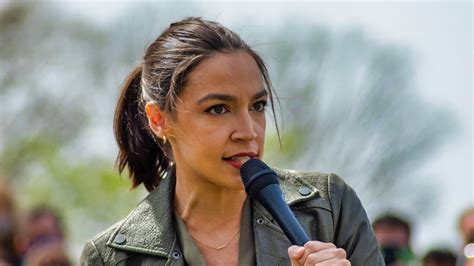 Alexandria Ocasio-Cortez speaking at a rally