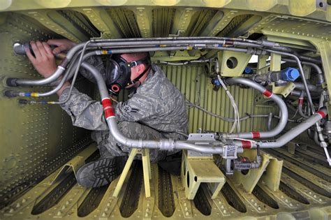 Air Force Aircraft Mechanic Inspecting Aircraft Fuel Systems