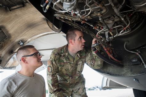 Air Force Aircraft Mechanic Working on Avionics Systems