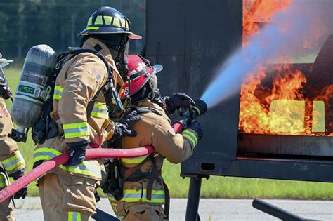 Air Force Firefighter conducting fire safety inspection