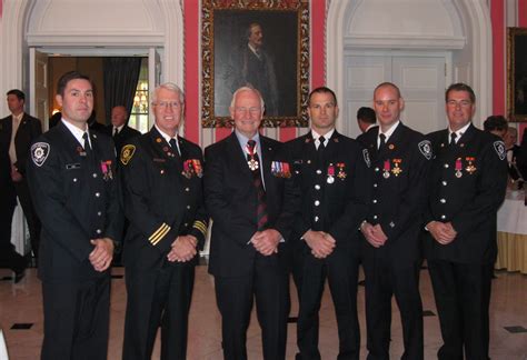 Air Force Firefighter receiving award for bravery