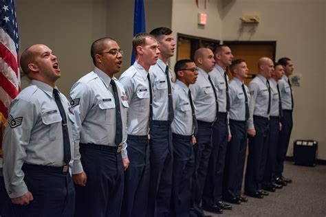 An Air Force recruiter talking to a potential recruit