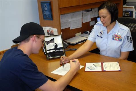 Air Force Recruiter Working on Computer