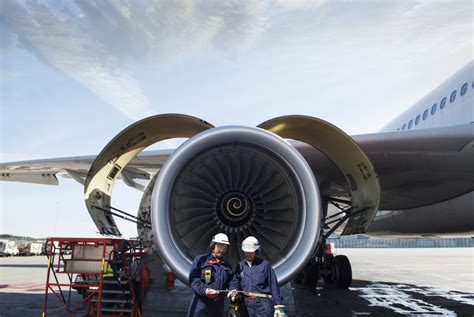 Aircraft Engine Mechanic working on a jet engine