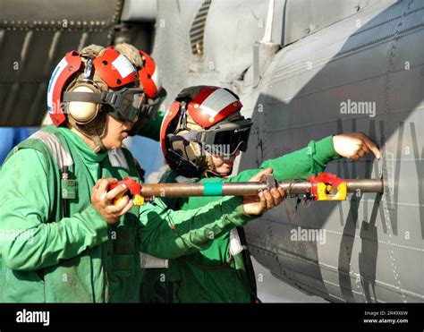 Aircraft Structural Mechanic working on a cargo plane