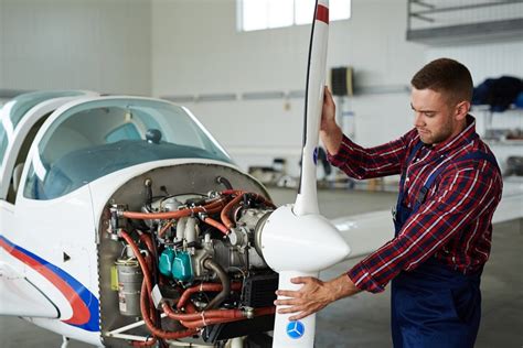 Airplane Mechanic holding a certificate