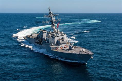 Arleigh Burke-class destroyer conducting a replenishment-at-sea