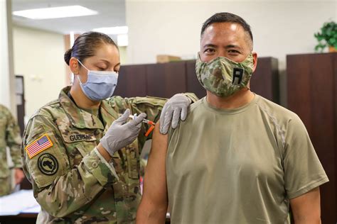 Army Medics Assisting Physicians