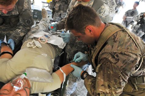 Army Medics Using Medical Equipment