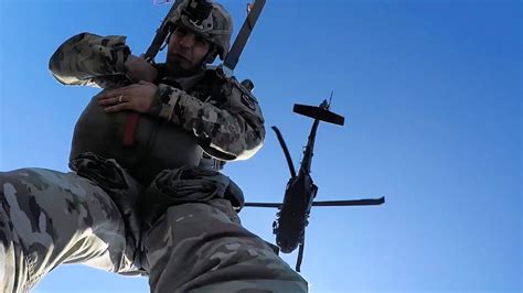 Army Rangers jumping out of a plane