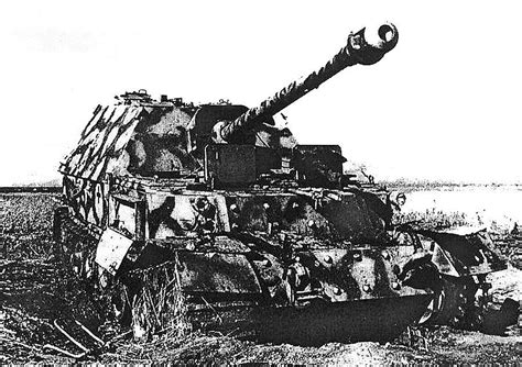 Soviet soldiers inspect a captured German tank during the Battle of Kursk