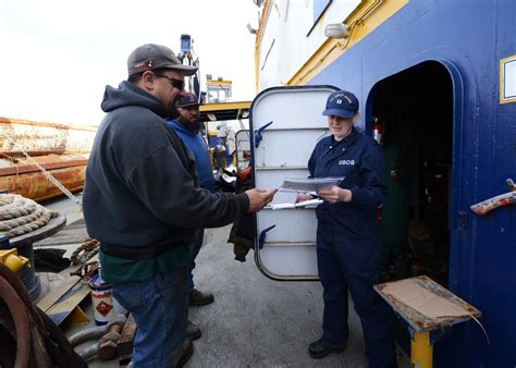 Coast Guard Divers Inspecting a Ship