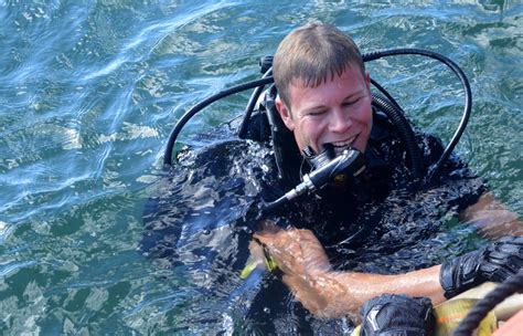 Coast Guard Divers Conducting Underwater Salvage Operations