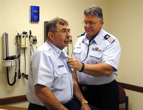 A picture of Coast Guard officers receiving healthcare