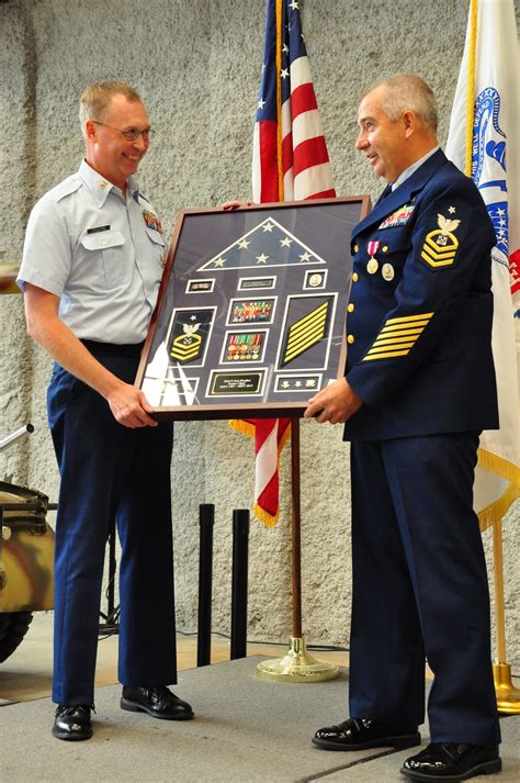 A picture of Coast Guard officers in retirement