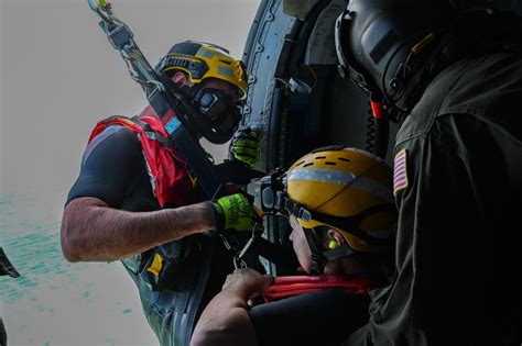 Coast Guard Rescue Swimmer during a rescue operation