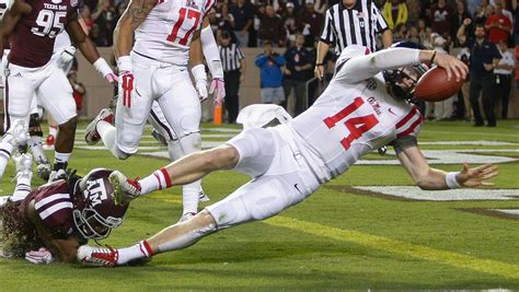 College football players in action