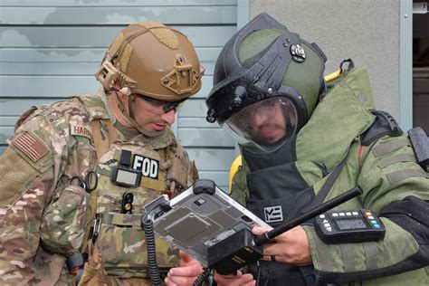 EOD Specialist Working On Explosive Device