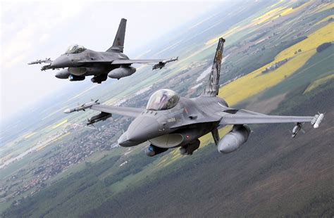 F-16 Jets lined up on the runway