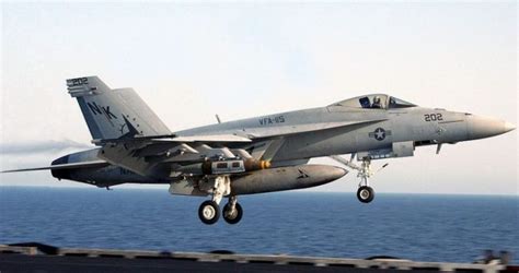 F-18 Hornet landing on an aircraft carrier