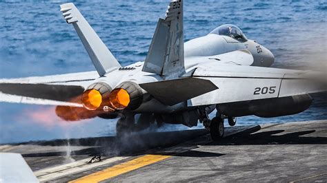 F/A-18 Hornet taking off from a runway