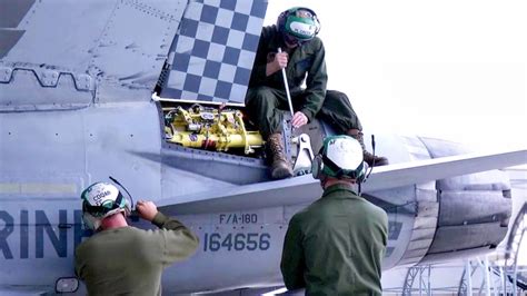 F/A-18 maintenance crew at work