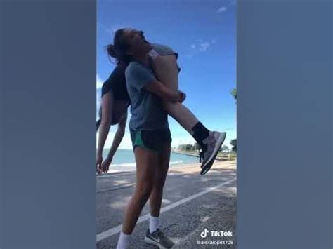 Women participating in F/F lift and carry competitions, demonstrating their strength and endurance