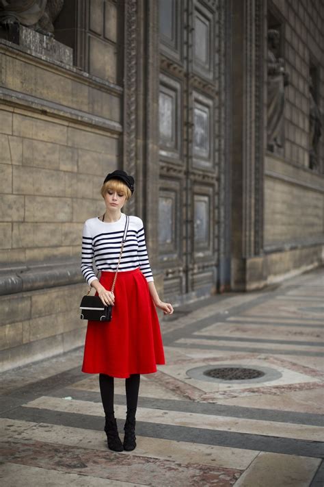 A model walking the runway during Paris Fashion Week