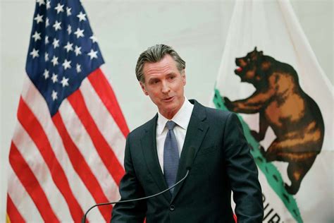 Gavin Newsom speaking at a podium