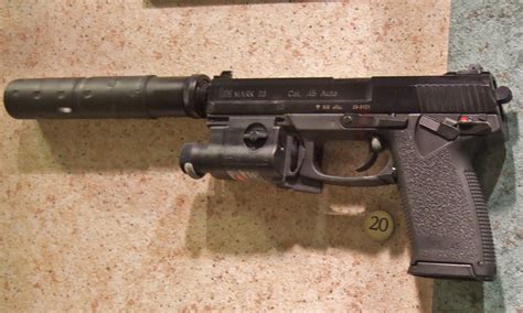 HK MK 23 SOCOM Pistol with Suppressor