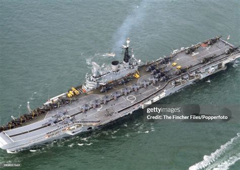 HMS Hermes with aircraft on deck