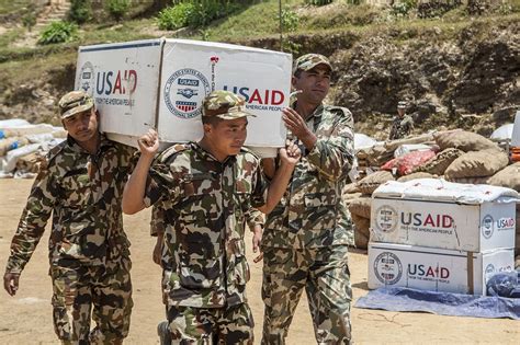 Coast Guard aircraft delivering aid to a disaster-stricken area