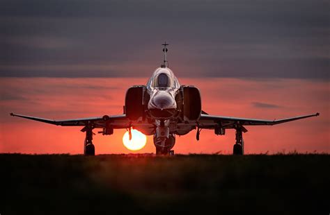 Aerial view of a jet at sunset