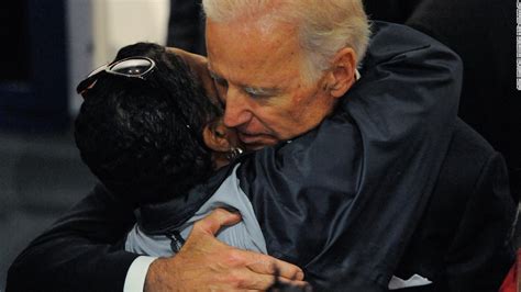 Joe Biden hugging a child