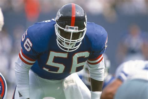 Lawrence Taylor sacking quarterback