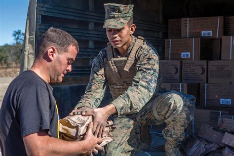 Marines providing humanitarian aid during a disaster relief effort