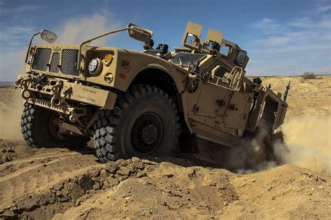 Marine Corps Motor T Experts Maintaining Vehicles