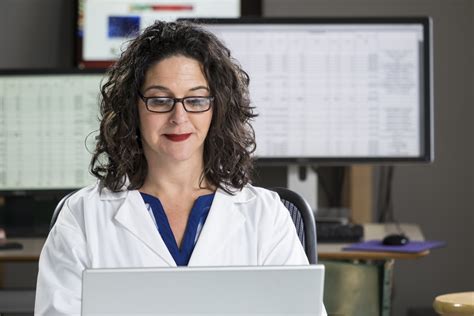 Medical Records Technician Analyzing and Reporting Medical Data