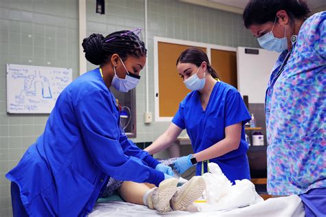 Military Nurse Providing Care To Patient