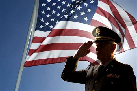 Soldiers saluting during a ceremony