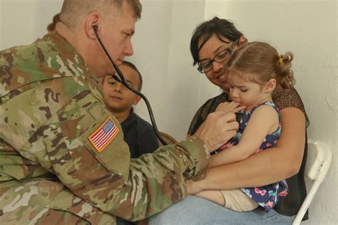 National Guard soldiers providing humanitarian aid